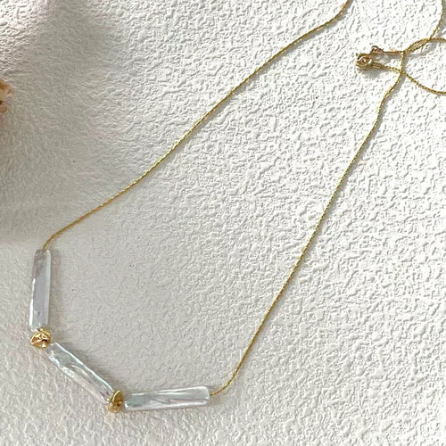 Aurelle Triple Baroque Pearl Necklace — product view 1