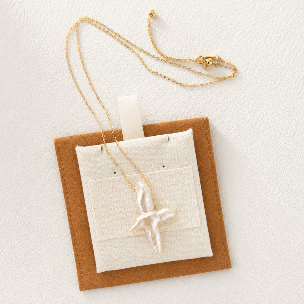 Celeste Gold-Plated Pearl Cross Necklace — product view 2