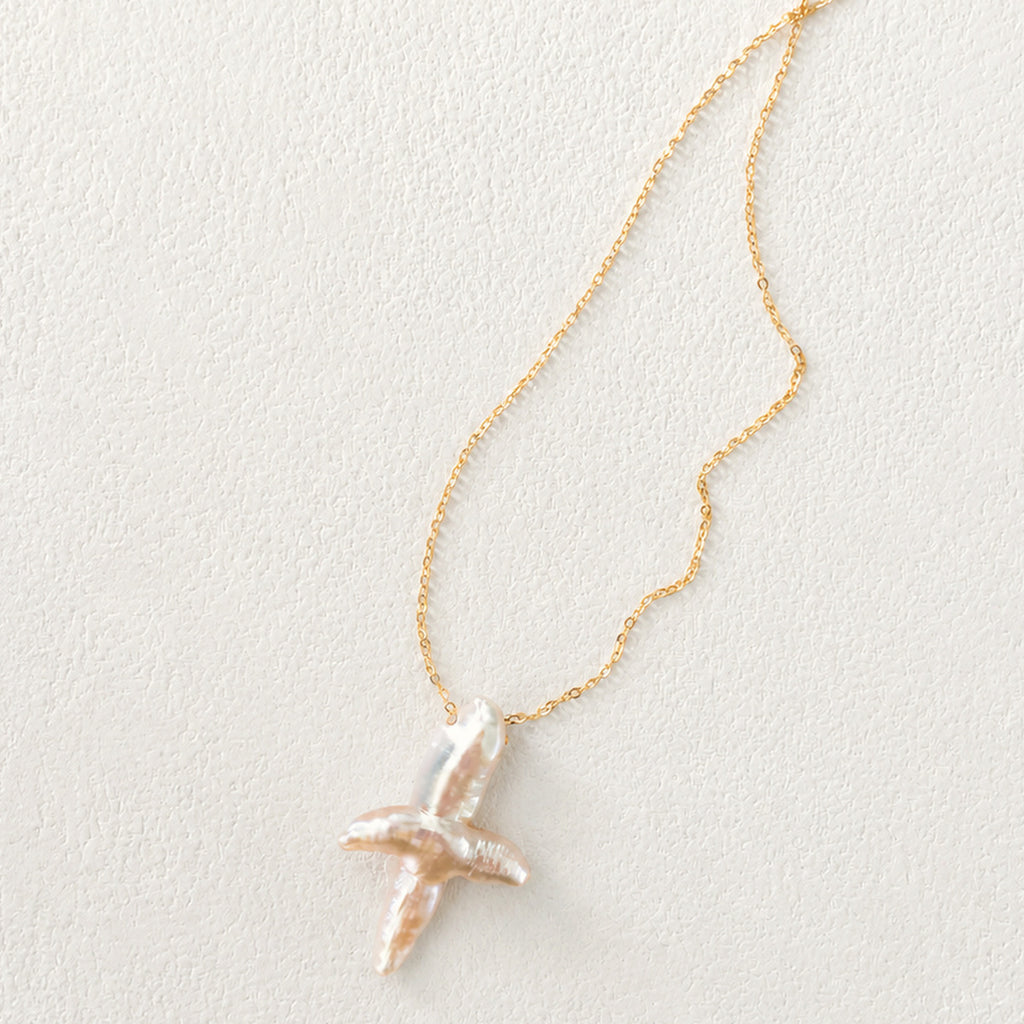 Celeste Gold-Plated Pearl Cross Necklace — product view 1